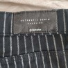 Jeans skinny noir rayé blanc T 40 Stradivarius
- Etiquette arrière